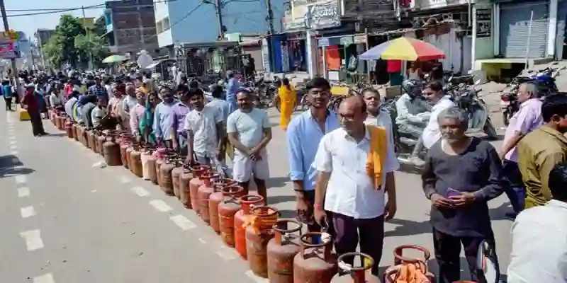 LPG supply crisis India as people queue with gas cylinders for refill